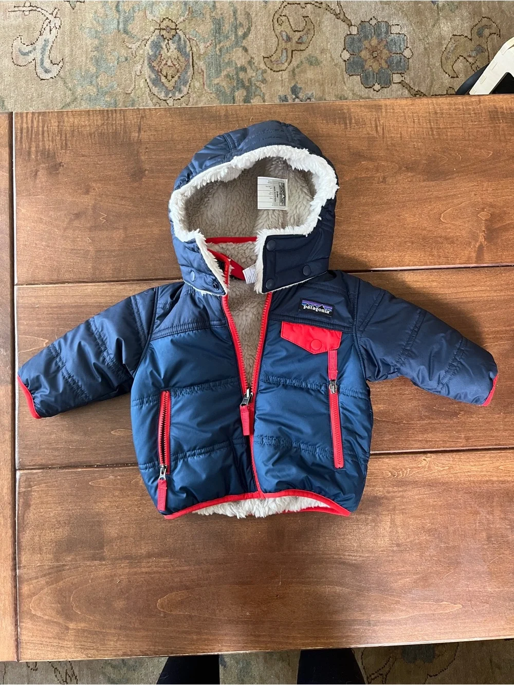 Patagonia Navy Infant Hooded Puffer Jacket with Red Accents